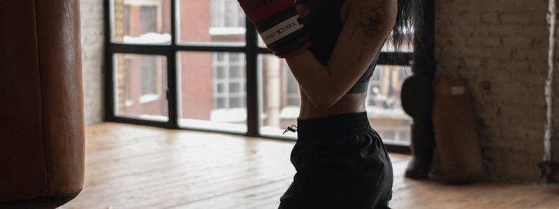 Athlete holding a controlled static position during a workout.